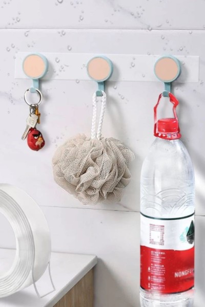 Haczyki na ścianie przyczepione taśmą nano